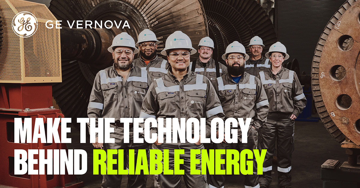 GE Vernova team members in safety gear standing together in an industrial energy facility