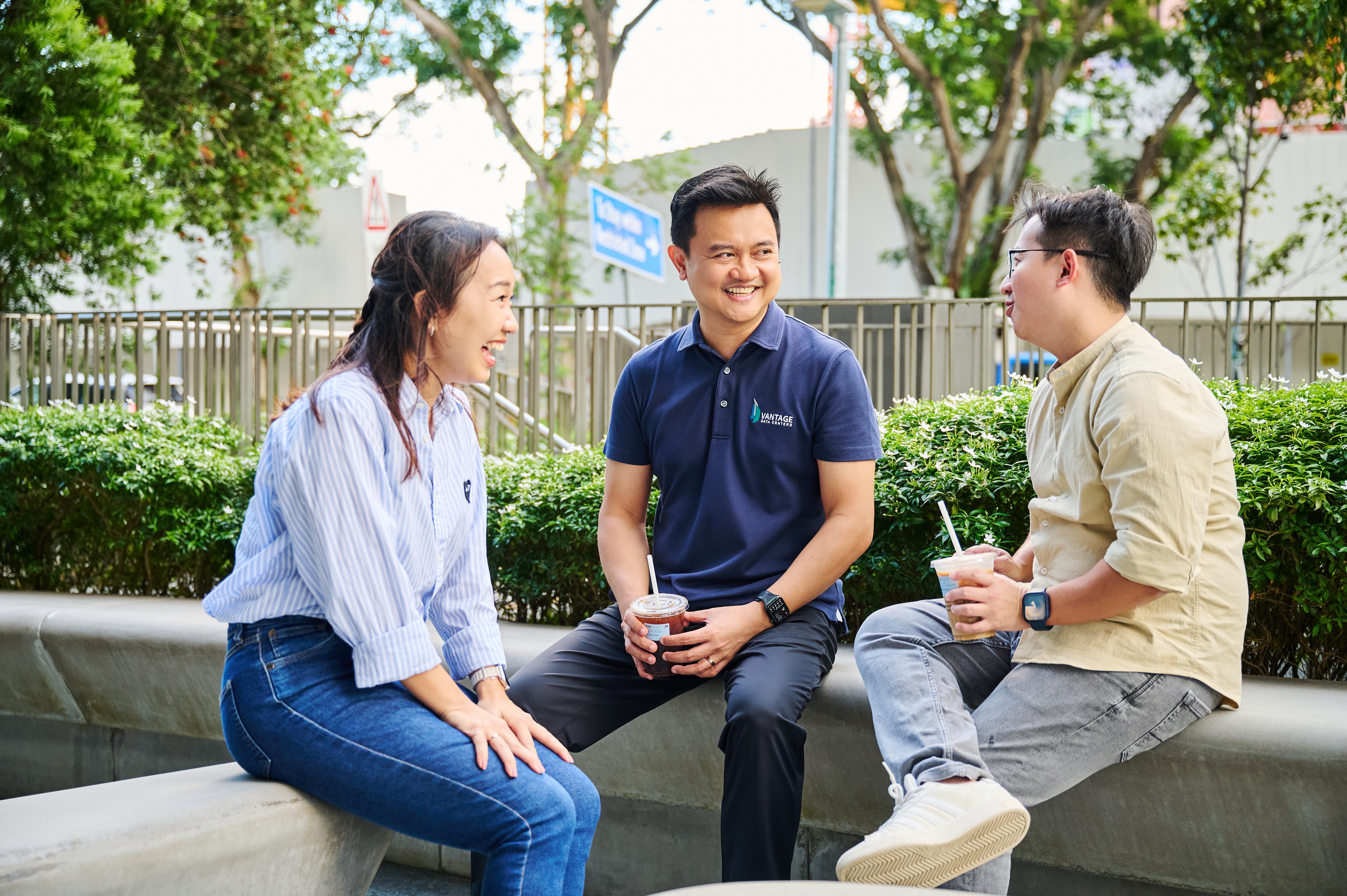 Engineering professionals collaborating in a modern data center environment