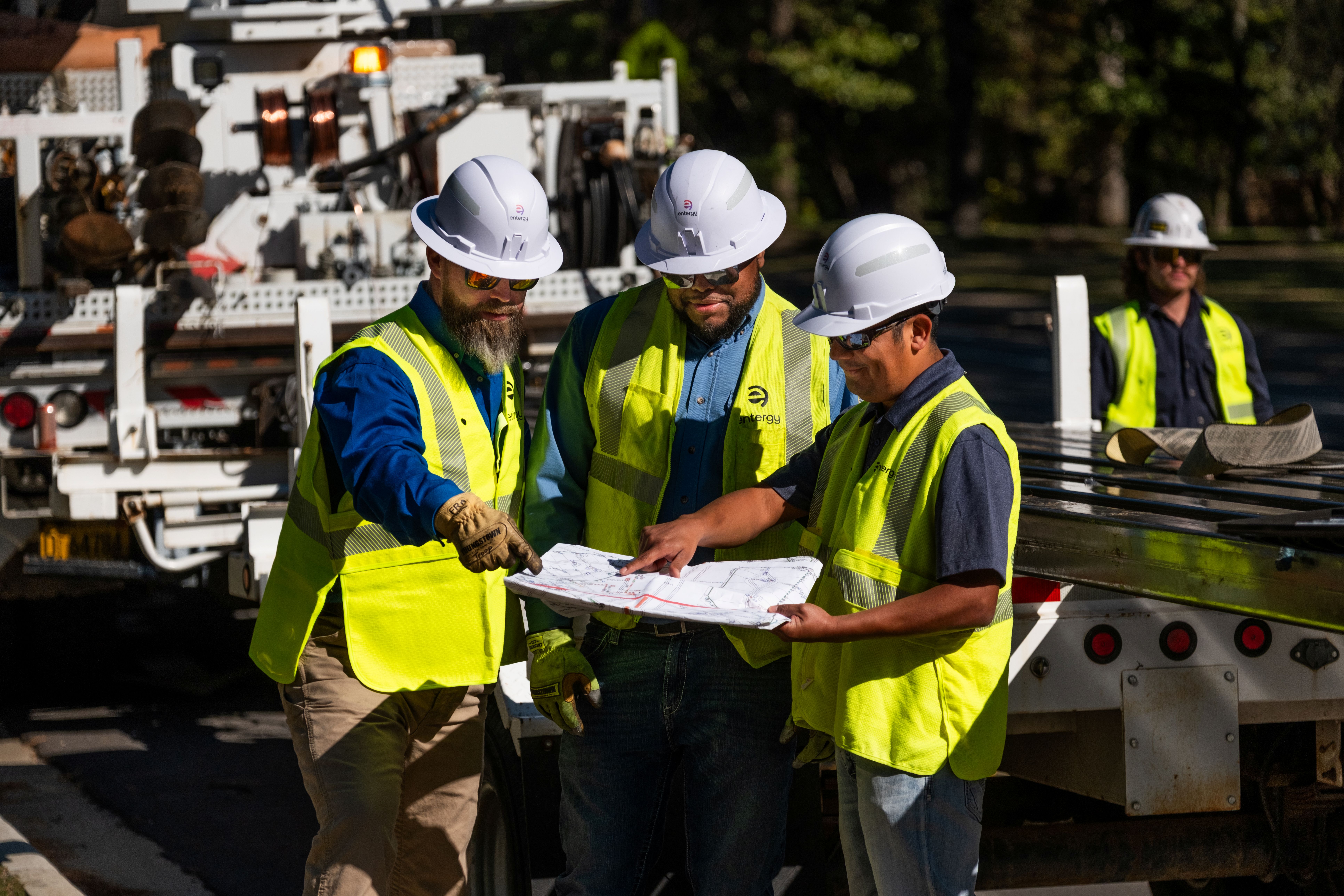 Nuclear professionals collaborating at a worksite